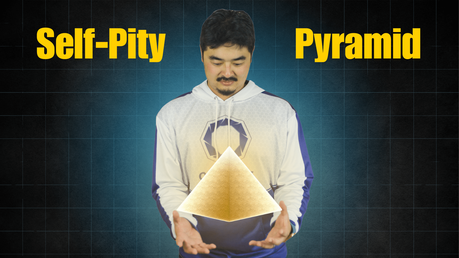 Yu-kai Chou holding a glowing golden pyramid - visual introduction to the Self-Pity Pyramid model